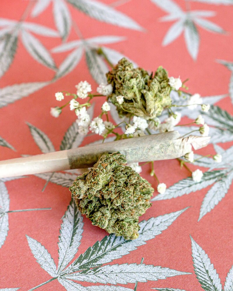 Green Kush on Red and White Textile