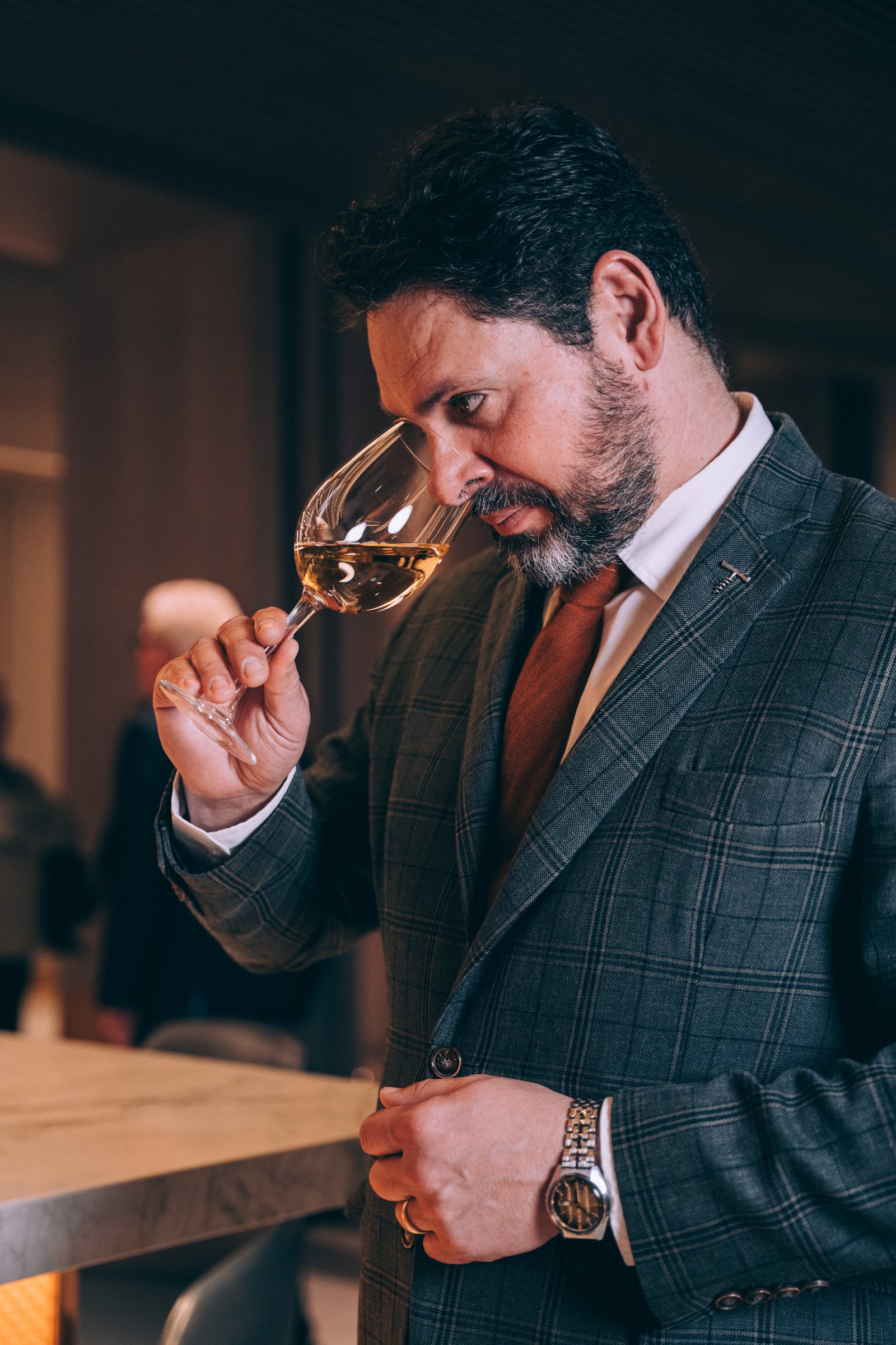 International gastronomy professional evaluating Norwegian cider in market